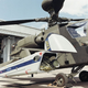 An AVPRO EXINT pod on an Apache’s weapons sponson